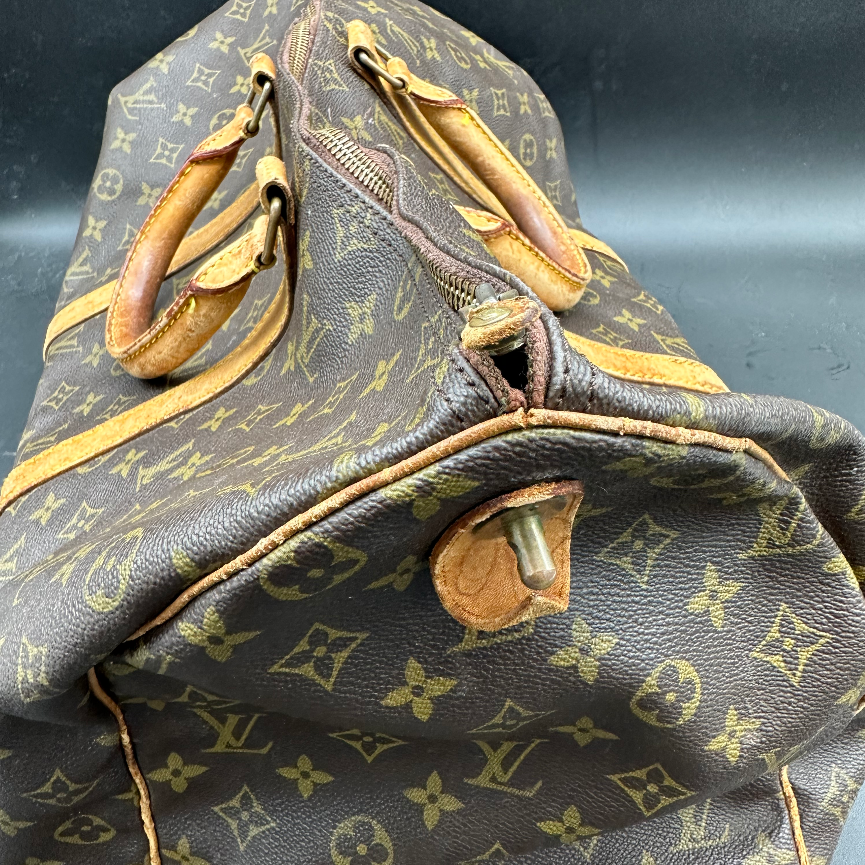 Riparazioni borsoni Louis Vuitton