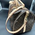 Riparazioni borsoni Louis Vuitton