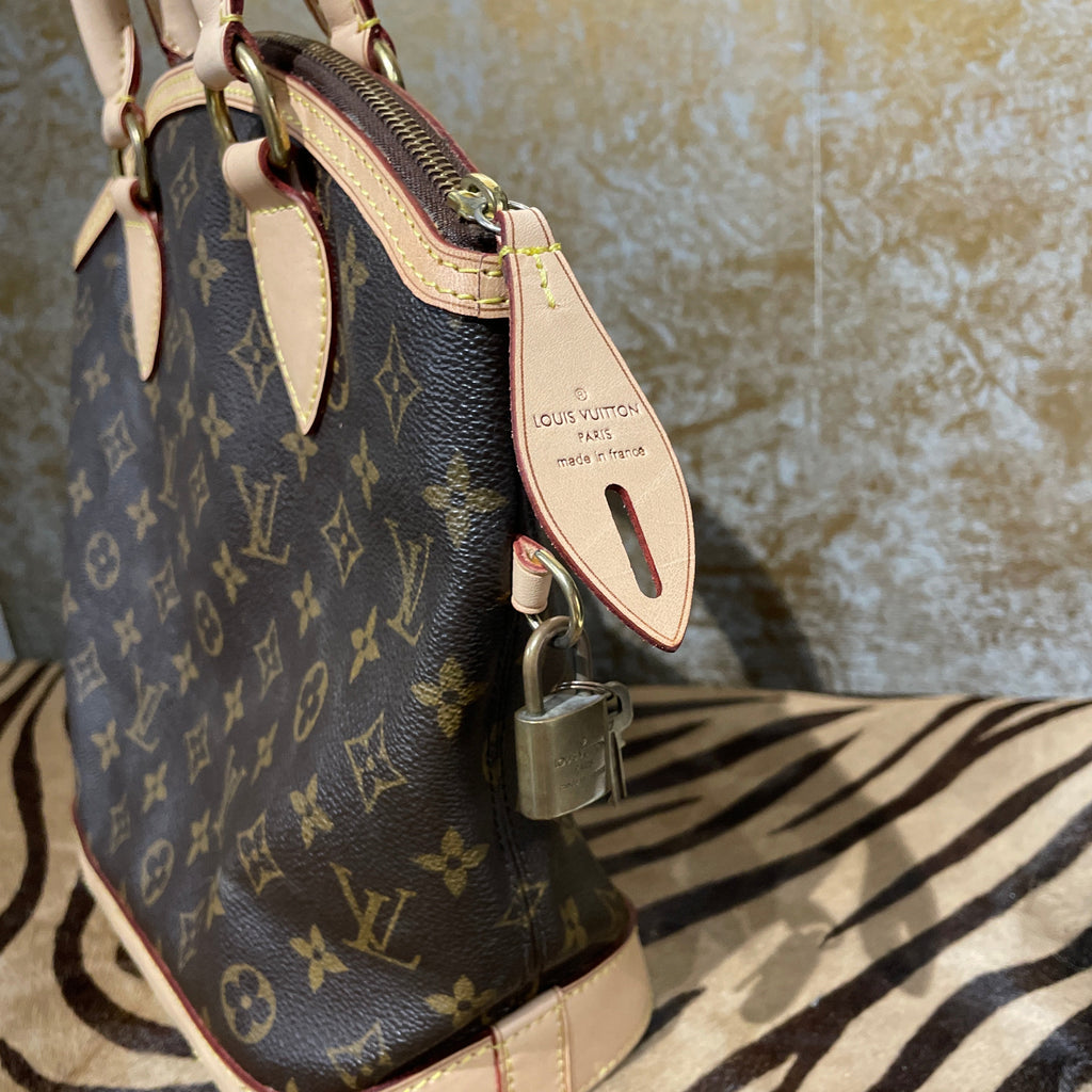 Riparazioni Louis Vuitton Lockit Vertical