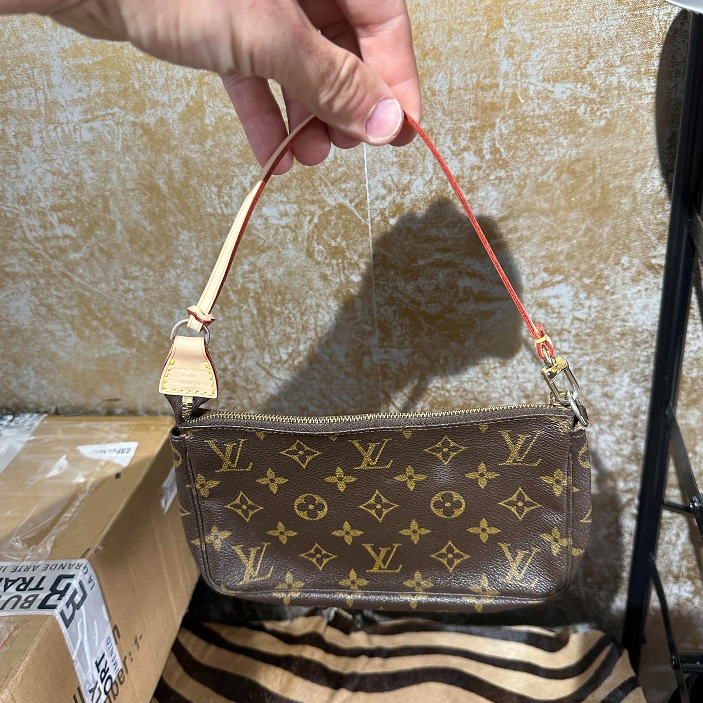 Riparazioni Pochette Louis Vuitton